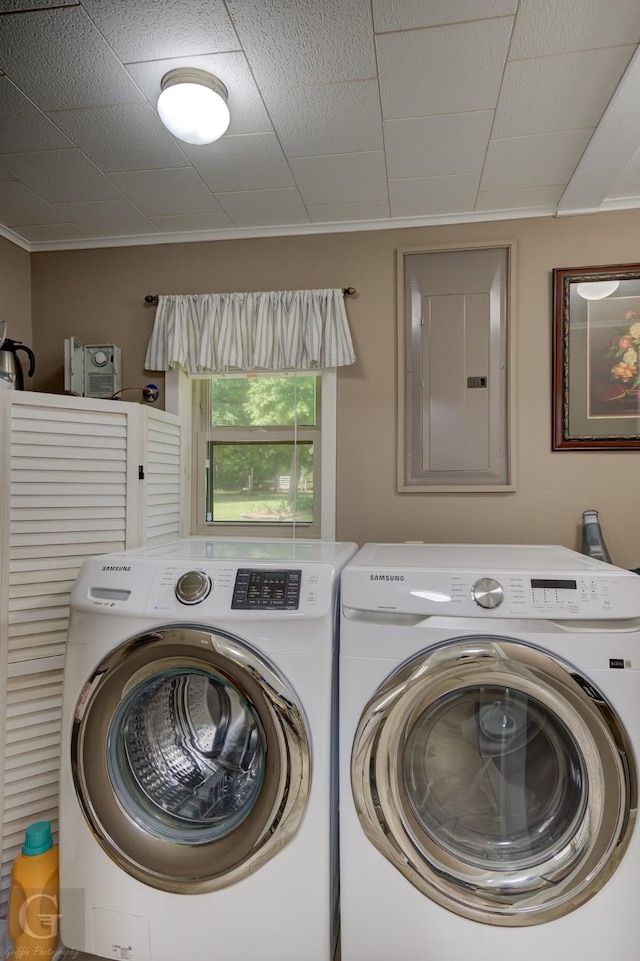 451 Burney St, Coushatta, LA 71019 - clothes washing area featuring electric panel, washing machine and dryer, and ornamental molding