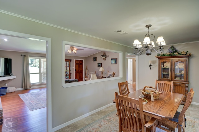 451 Burney St, Coushatta, LA 71019 - dining area with a chandelier, ornamental molding, and baseboards