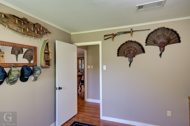 451 Burney St, Coushatta, LA 71019 - spare room featuring wood finished floors, baseboards, and crown molding