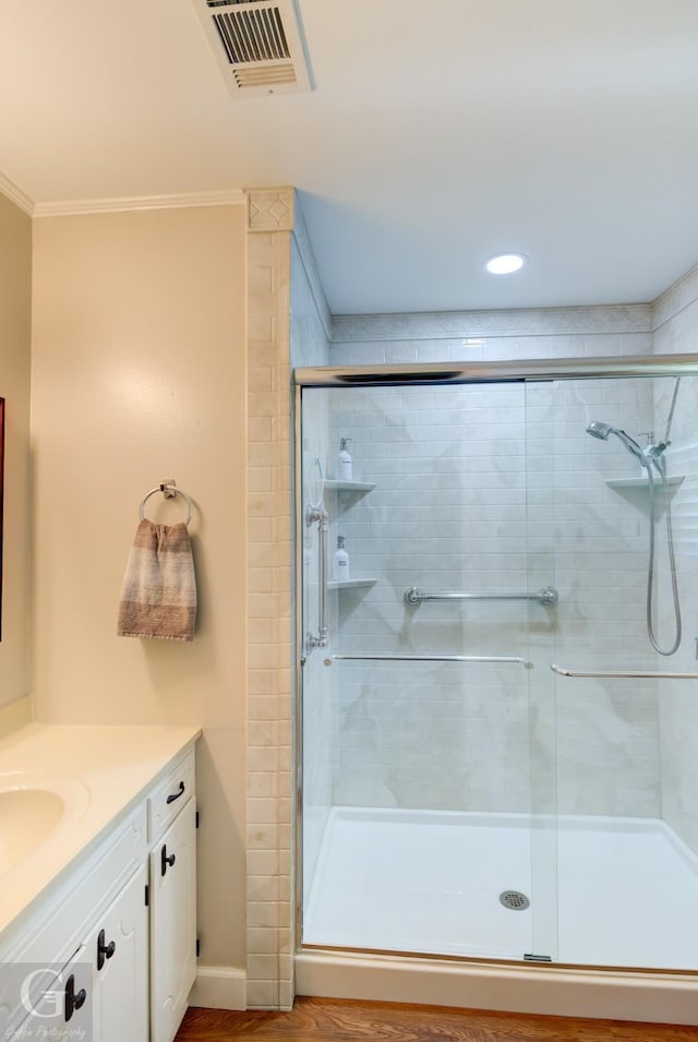 451 Burney St, Coushatta, LA 71019 - full bath with a shower stall, crown molding, vanity, and recessed lighting
