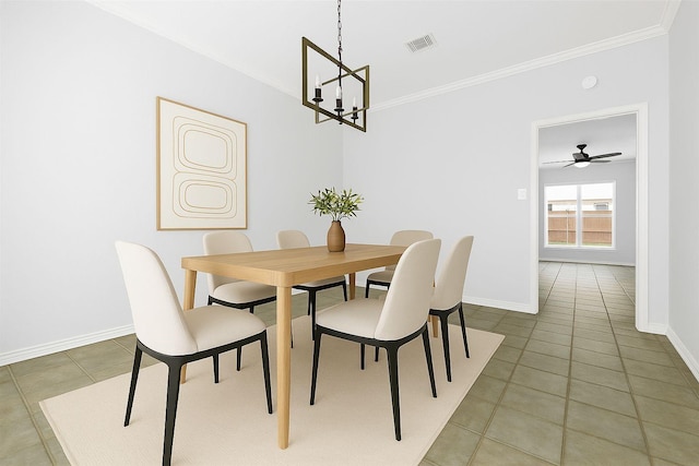 1315 Falcon Dr, Lewisville, TX 75077 - dining space featuring a chandelier, light tile patterned floors, ornamental molding, baseboards, and a ceiling fan