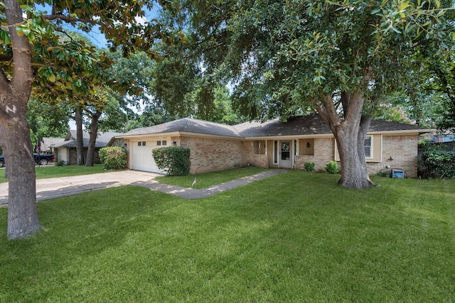 ranch-style home featuring a garage, brick siding, concrete driveway, and a front yard