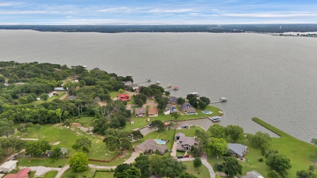 aerial overview of property's location featuring a large body of water and nearby suburban area