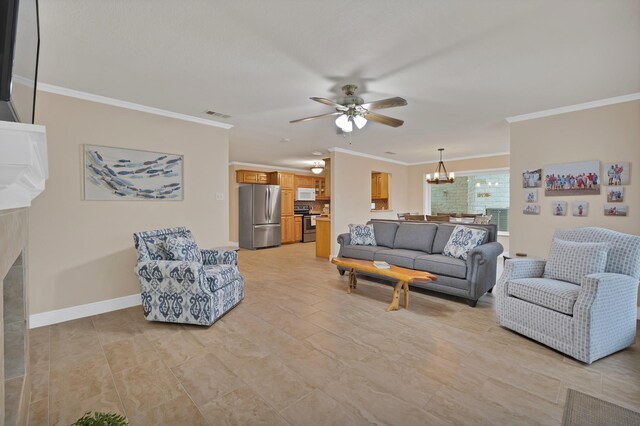 living area with a ceiling fan, crown molding, a chandelier, and baseboards