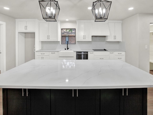 309 Rash Ln, Terrell, TX 75160 - kitchen featuring a chandelier, dishwasher, a sink, black electric stovetop, and a spacious island