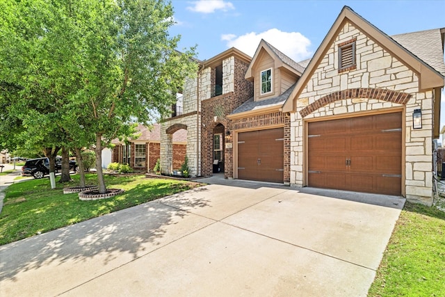 6273 El Capitan St, Fort Worth, TX 76179 - view of front facade with driveway, brick siding, a front yard, an attached garage, and roof with shingles