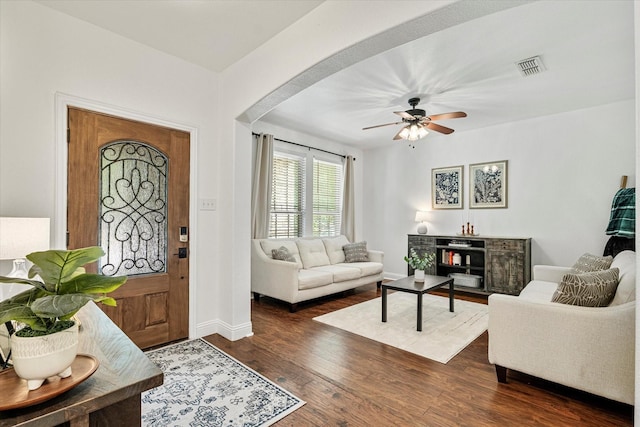 6273 El Capitan St, Fort Worth, TX 76179 - living area with wood finished floors, baseboards, ceiling fan, and arched walkways