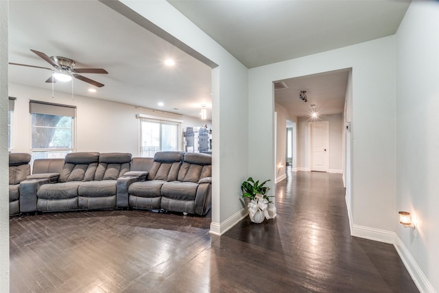 living room with ceiling fan, dark wood-type flooring, baseboards, and recessed lighting