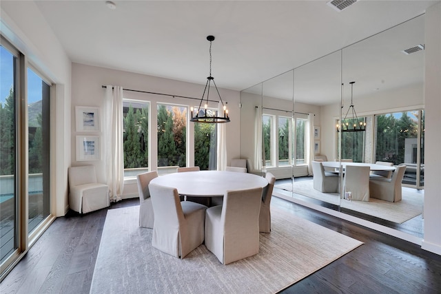 3520 Valmur Ave, Colleyville, TX 76034 - dining space with a chandelier and wood finished floors