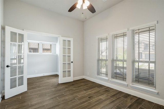 9117 Amistad Ln, Denton, TX 76226 - unfurnished room featuring french doors, dark wood-style flooring, a ceiling fan, and baseboards