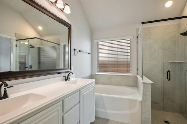9117 Amistad Ln, Denton, TX 76226 - full bath with lofted ceiling, a stall shower, a bath, double vanity, and recessed lighting