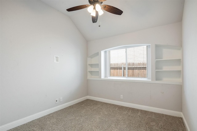 9117 Amistad Ln, Denton, TX 76226 - carpeted empty room with vaulted ceiling, ceiling fan, and baseboards
