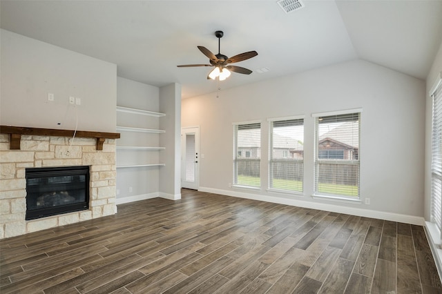 9117 Amistad Ln, Denton, TX 76226 - unfurnished living room with a ceiling fan, dark wood-type flooring, a fireplace, baseboards, and lofted ceiling
