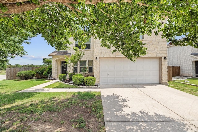1800 Grassland Dr, Leander, TX 78641 - view of front facade with stone siding, driveway, and a garage
