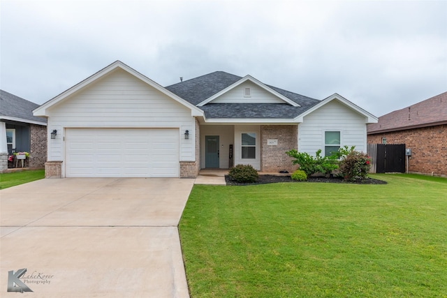 view of front of property featuring brick siding, a shingled roof, a garage, and driveway