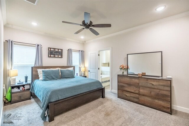 bedroom featuring carpet flooring, ornamental molding, ensuite bath, baseboards, and recessed lighting