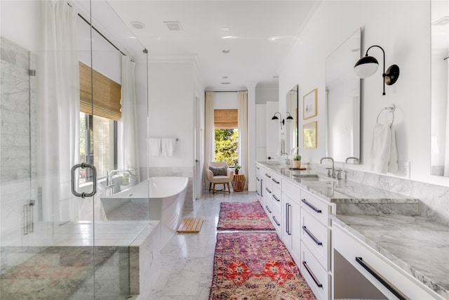 6905 Northridge Dr, Dallas, TX 75214 - bathroom with a soaking tub, vanity, marble tiled flooring, and a shower stall