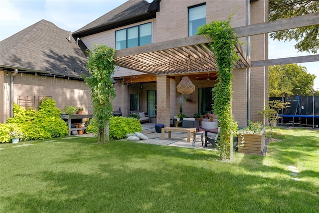 6905 Northridge Dr, Dallas, TX 75214 - rear view of house featuring a trampoline, brick siding, an outdoor living space, and a patio