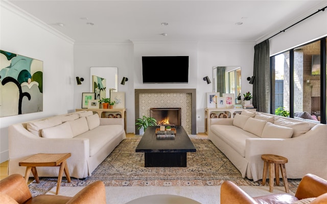 6905 Northridge Dr, Dallas, TX 75214 - living area featuring ornamental molding, a fireplace, and wood finished floors