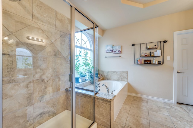 314 Trakehner Trl, Celina, TX 75009 - full bath featuring a stall shower, a garden tub, and tile patterned flooring