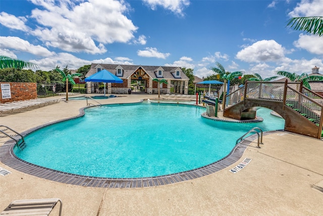 314 Trakehner Trl, Celina, TX 75009 - community pool featuring a patio area and fence