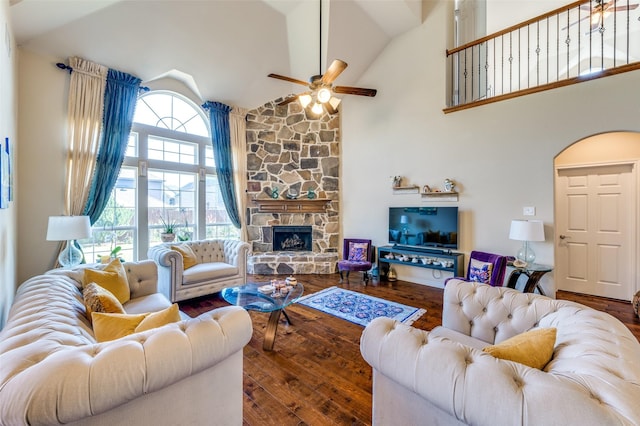 314 Trakehner Trl, Celina, TX 75009 - living room with high vaulted ceiling, ceiling fan, wood-type flooring, and a stone fireplace