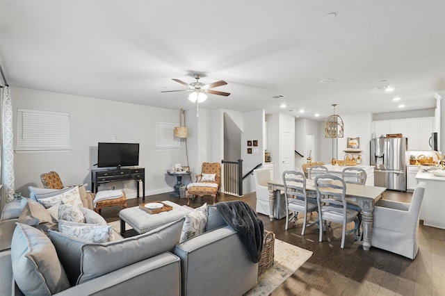 living room with ceiling fan, dark wood-type flooring, and recessed lighting