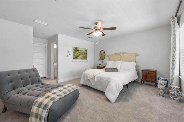 bedroom featuring light carpet, ceiling fan, and baseboards