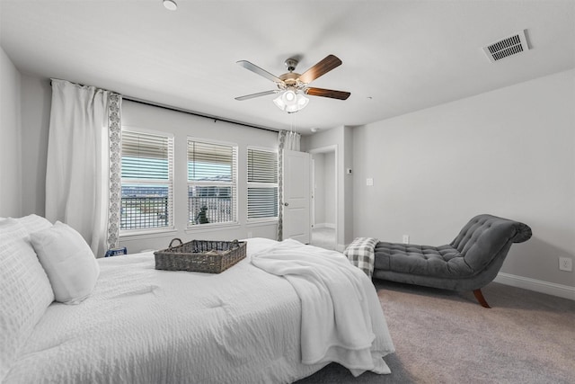 bedroom featuring carpet flooring, baseboards, and ceiling fan