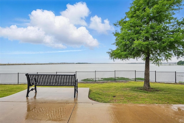 view of community with a water view