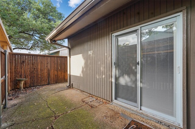 9826 Bent Branch Ln, Dallas, TX 75243 - view of home's exterior with fence