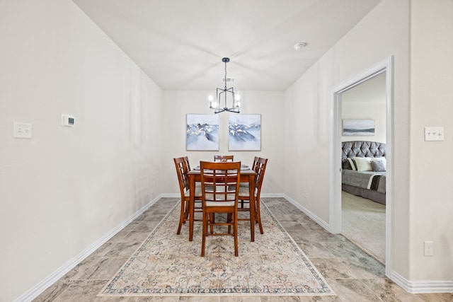 3249 Glorioso Dr, Royse City, TX 75189 - dining room with a chandelier, baseboards, and stone finish flooring
