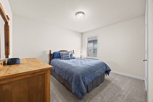 3249 Glorioso Dr, Royse City, TX 75189 - bedroom with carpet floors and baseboards