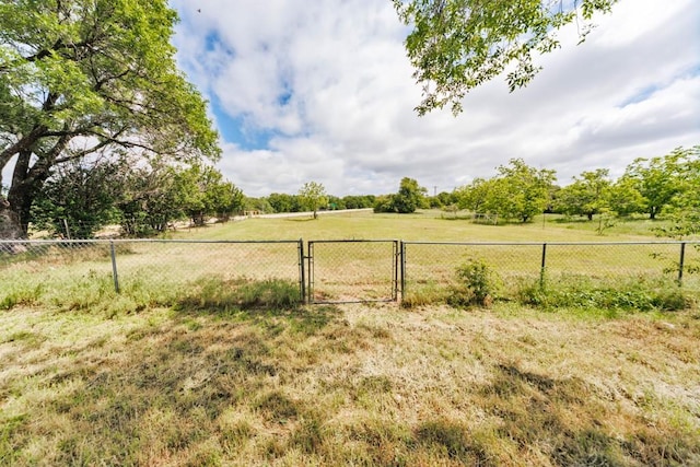 1941 State Highway 59 S, Bowie, TX 76230 - view of yard with a view of countryside and a gate