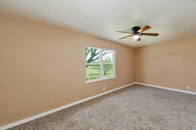 1941 State Highway 59 S, Bowie, TX 76230 - carpeted spare room featuring ceiling fan and baseboards