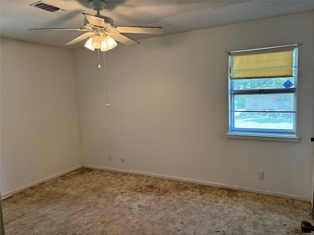 3122 Frances Dr, Denison, TX 75020 - unfurnished room with carpet floors, baseboards, and a ceiling fan
