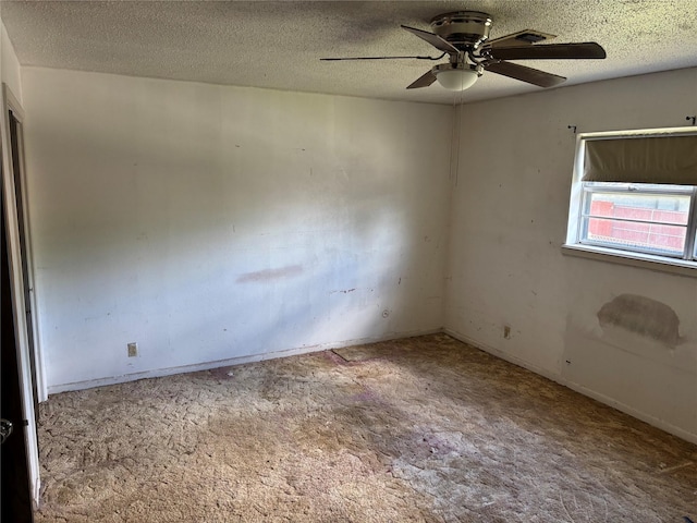 3122 Frances Dr, Denison, TX 75020 - carpeted empty room featuring ceiling fan, a textured ceiling, and baseboards