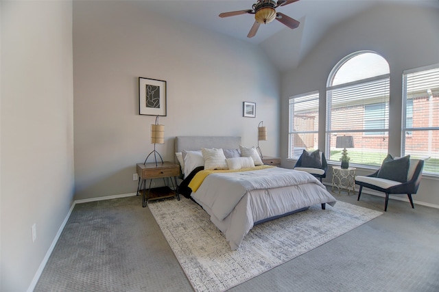 bedroom with carpet floors, baseboards, lofted ceiling, and a ceiling fan