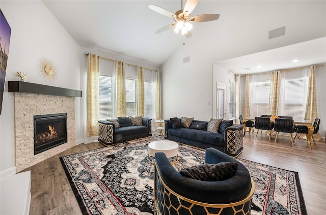 2507 Henley Way, Mansfield, TX 76084 - living room with a ceiling fan, a glass covered fireplace, wood finished floors, and high vaulted ceiling