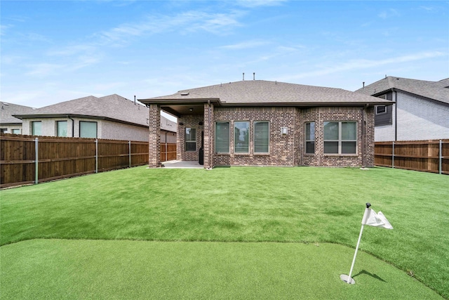 2507 Henley Way, Mansfield, TX 76084 - rear view of property featuring brick siding and roof with shingles