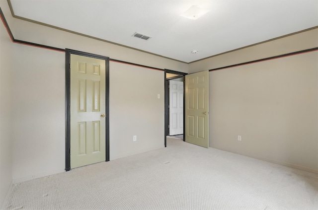 unfurnished bedroom featuring carpet floors
