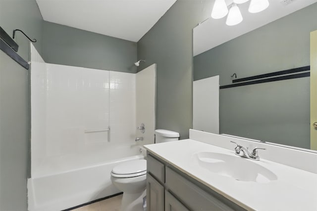 full bath featuring toilet, tile patterned flooring, shower / bathtub combination, and vanity