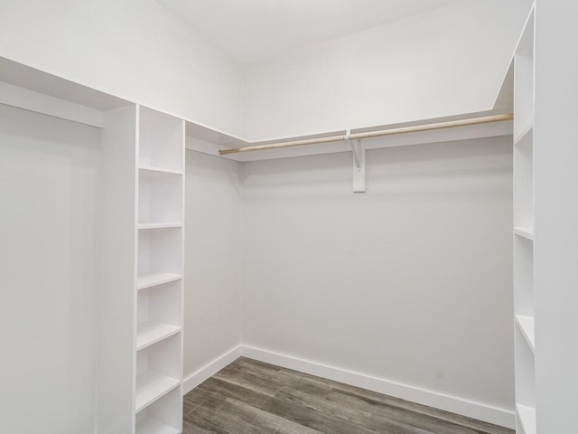 610 SW 3rd St, Kerens, TX 75144 - spacious closet featuring dark wood-style flooring