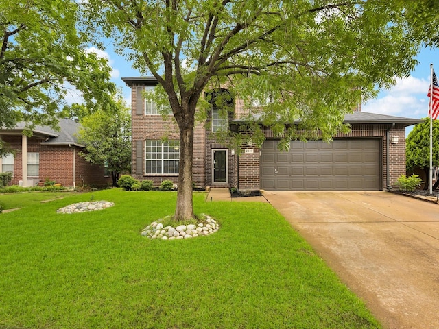 view of front of property with brick siding, driveway, a front yard, and an attached garage