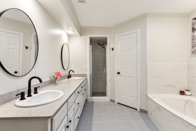 full bath with ornamental molding, a bath, a shower stall, double vanity, and tile patterned flooring