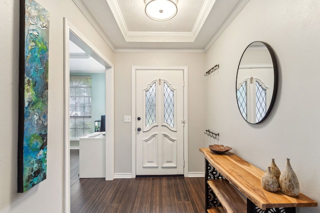 entryway with dark wood-style flooring, baseboards, and ornamental molding