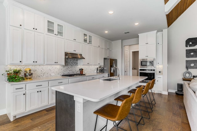 175 Stirling Dr, Argyle, TX 76226 - kitchen featuring stainless steel appliances, a sink, dark wood finished floors, backsplash, and recessed lighting