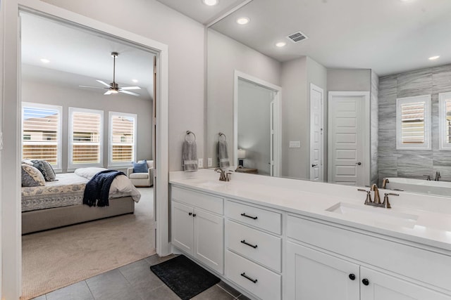 175 Stirling Dr, Argyle, TX 76226 - ensuite bathroom with tile patterned flooring, double vanity, ceiling fan, recessed lighting, and a freestanding bath