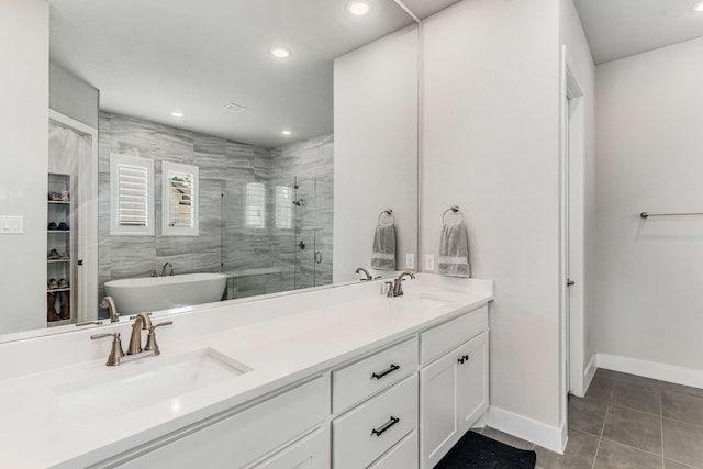 175 Stirling Dr, Argyle, TX 76226 - full bath with a stall shower, tile patterned floors, recessed lighting, a soaking tub, and double vanity