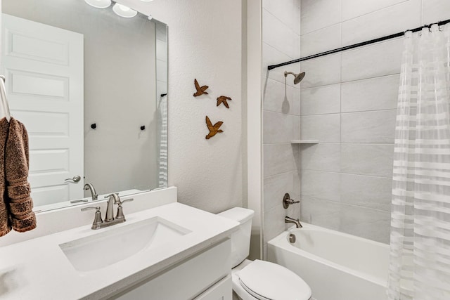 175 Stirling Dr, Argyle, TX 76226 - bathroom with toilet, shower / bath combo with shower curtain, vanity, and a textured wall
